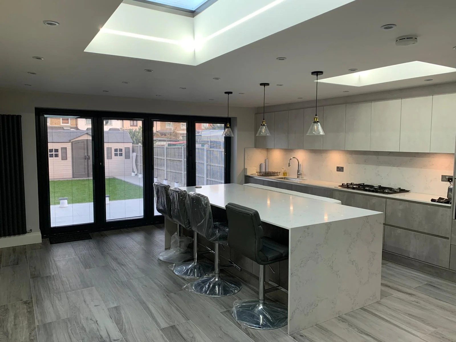 Open-plan kitchen with skylight